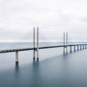The Oresund Bridge located in Malmo, Sweden on the calm blue water during daylight